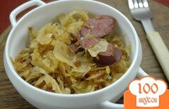 Фото рецепта: Кислая капуста, тушенная с колбасками и тмином