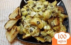 Фото рецепта: Картофель запеченный с грибами, тушеными в сметане