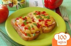Фото рецепта: Горячие бутерброды с ветчиной, помидорами и сыром