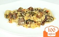Фото рецепта: Говядина, тушеная с рисом и овощами