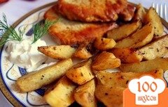 Фото рецепта: Запеченные картофельные дольки