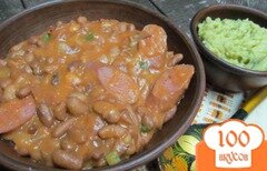 Фото рецепта: Сосиски с фасолью под кетчупом
