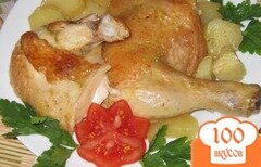 Фото рецепта: Курица запеченная с картофелем в духовке