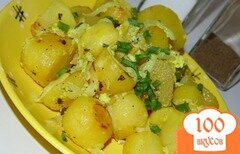 Фото рецепта: Картофель запеченный со сметаной и луком в рукаве